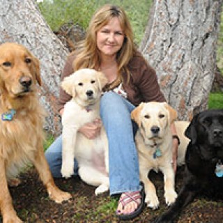 Jennifer Kachnic and her four dogs