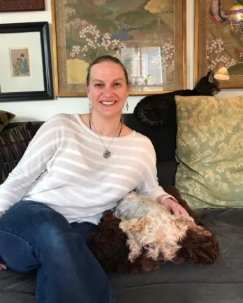 brunette woman with dog