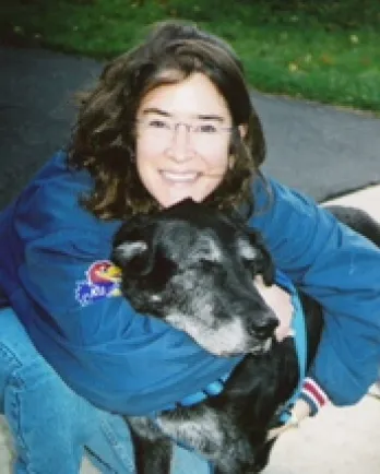 Renee Boothroyd, retired board member, with senior dog